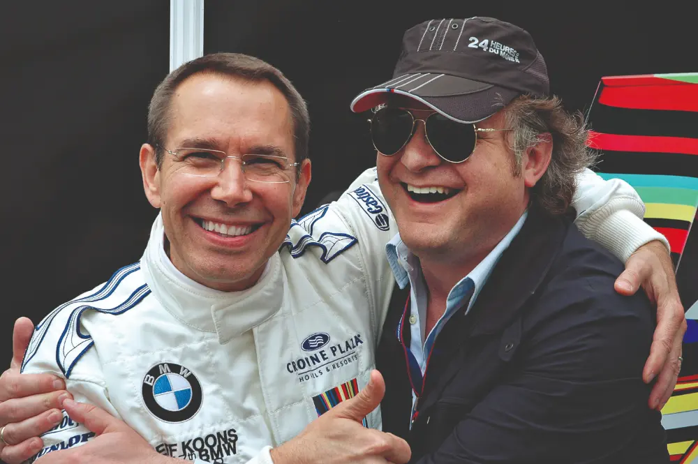 Prof Dr Thomas Girst with global artist Jeff Koons, at Le Mans in 2010